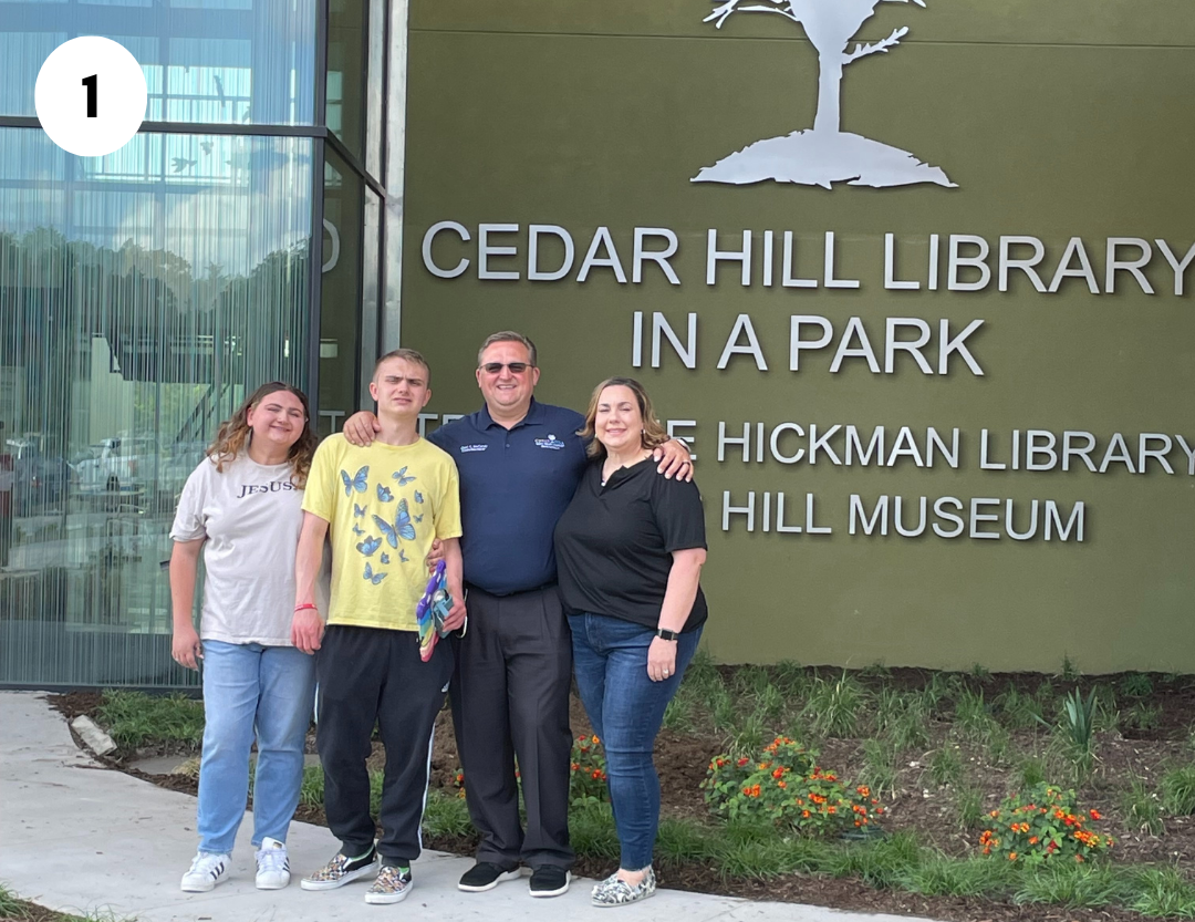 Group in Front of Library Ready for a Tour